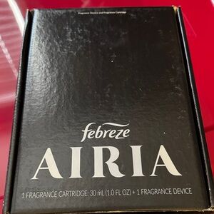 Febreze AIRIA Fragrance Device in Black Packaging